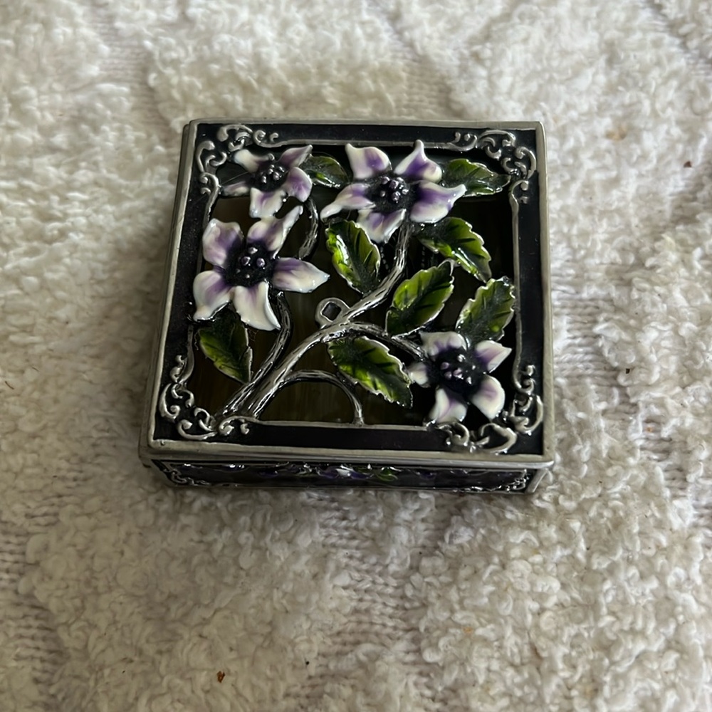 Small purple flower box with dragonfly inside